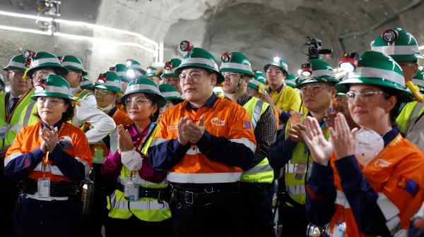 Mongolian Prime Minister&nbsp;Oyun-Erdene Luvsannamsrai, center, attends a commencement ceremony for underground production at the Oyu Tolgoi copper mine in the Gobi Desert in March 2023.