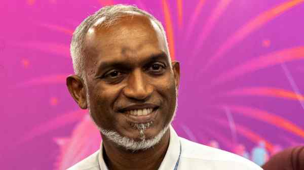 Mohamed Muizzu, winner of the Maldives' presidential election, smiles after a news conference in Male on Sept. 30.