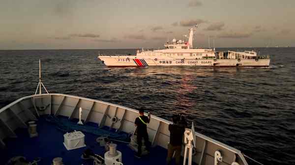 A Chinese Coast Guard vessel is seen from a&nbsp;Philippine Coast Guard ship near&nbsp;Second&nbsp;Thomas&nbsp;Shoal&nbsp;in the South China Sea on March 5.