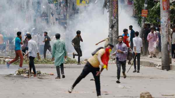 Protesters clash with authorities&nbsp;outside the state-owned&nbsp;Bangladesh&nbsp;Television&nbsp;in Dhaka on July 19 as violence erupts nationwide&nbsp;after anti-quota protests by students.