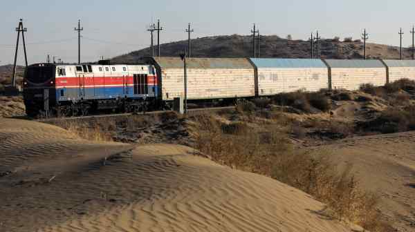 A train runs near the Chinese border in Kazakhstan. Much of the railway in Central Asia's Middle Corridor has aging infrastructure.