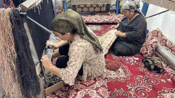 Women at work at&nbsp;the Khiva Silk Carpet Workshop in Khiva, Uzbekistan. The facility opened in 2001 with backing from sources including UNESCO. (All photos by Charukesi Ramadurai)