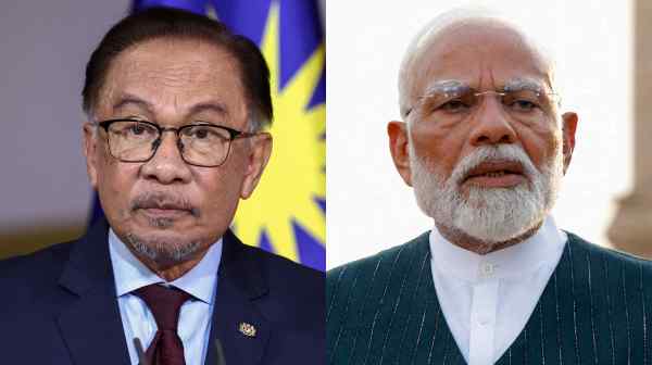 Malaysian Prime Minister Anwar Ibrahim, left, and Indian Prime Minister Narendra Modi. (Source photos by Reuters)