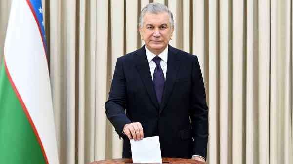 Uzbekistan's President Shavkat Mirziyoyev votes in Tashkent on April 30. The passage of constitutional reforms could allow him to stay in power until 2040.