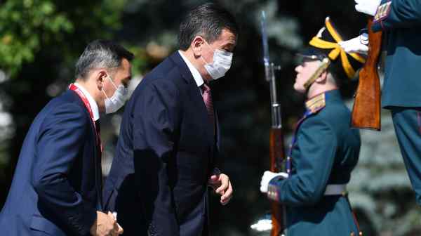 Kyrgyz President Sooronbai Jeenbekov arrives at the Kremlin before the Victory Day Parade in Moscow on June 24.