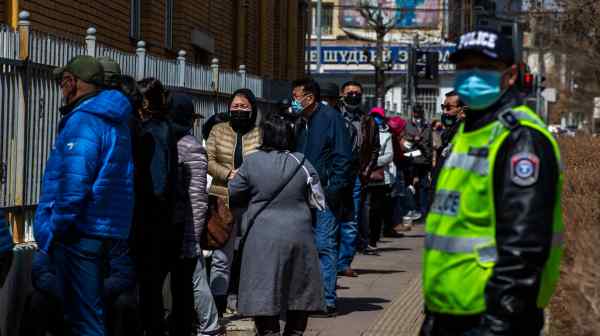 Older Mongolians lined up outside health centers on Thursday hoping to get their second shot of COVID vaccine, but the public vaccination program only resumed Friday. (Photo by Byambasuren Byamba-Ochir)