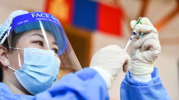 A medical worker prepares an injection of the&nbsp;Sinophorm vaccine in Ulaanbaatar, Mongolia. (Photo by Chadraa Chadraabal)