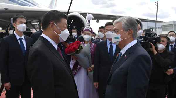 Chinese President Xi Jinping is welcomed by Kazakh President Kassym-Jomart Tokayev upon his arrival in Nur-Sultan on Sept. 14.