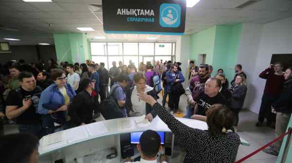 Russian citizens converge on a public service center in Almaty to receive&nbsp;individual identification numbers on Sept. 28.&nbsp;