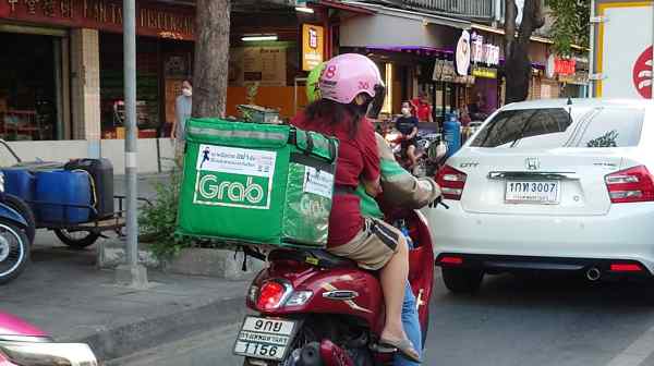 Grab accounted for 54% of ASEAN&rsquo;s food delivery gross market value in 2023. (Photo by Dylan Loh)