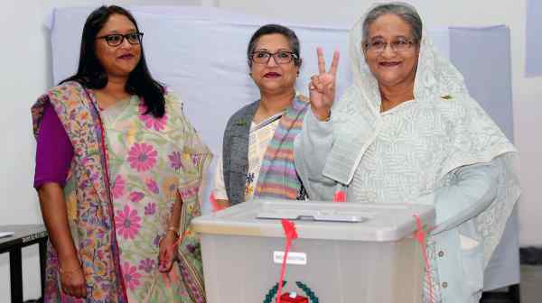 Saima Wazed, left, with her mother, Bangladeshi Prime Minister Sheikh Hasina, right, in 2014. Wazed has been chosen to lead the WHO's regional office for Southeast Asia.