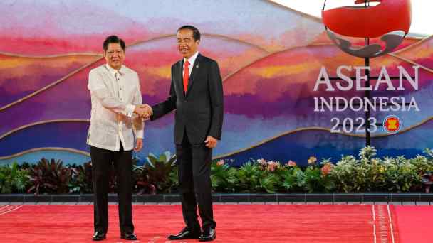 Indonesian President Joko Widodo, right, greets his&nbsp;Philippine counterpart, Ferdinand Marcos Jr., at the ASEAN Summit in Labuan Bajo, Indonesia, on&nbsp;May 10, 2023.