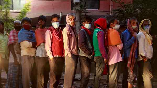 People line up outside a government hospital for a PCR test&nbsp;in Kathmandu in 2020: The COVID-19 pandemic provided the first substantial stress test for Nepal's federal system.