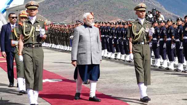 India's Prime Minister Narendra Modi arrives at Paro International Airport in Bhutan on March 22, paying a two-day state visit to the tiny but strategic Himalayan nation also courted by China.