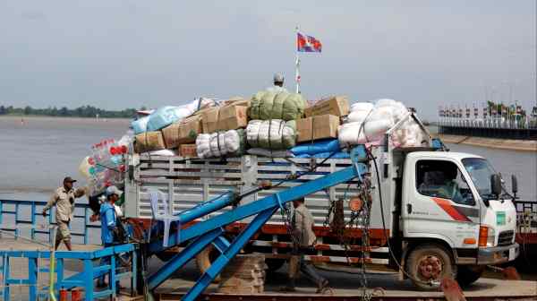 A truck ferries goods along the&nbsp;Mekong in Phnom Penh: Much freight from the capital now reaches the sea via&nbsp;Vietnamese ports.