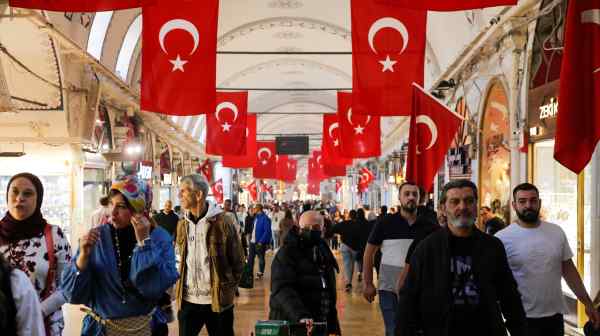 People shop at the Grand Bazaar in Istanbul.&nbsp;Turkey's fragile economy is suffering from high inflation and exchange rate volatility.