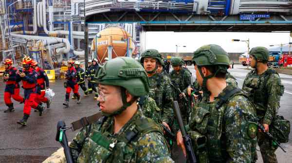 Soldiers participate in a drill in New Taipei City, Taiwan, on July 23.