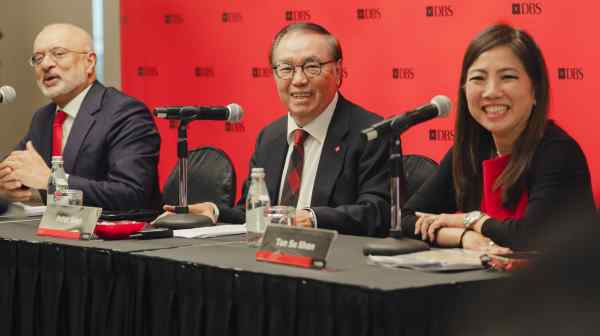 Tan Su Shan,&nbsp;right,&nbsp;was appointed DBS Group Holdings deputy chief executive on Aug. 7 and will replace Piyush Gupta, left,&nbsp;as CEO next year. They are pictured with DBS Chairman Peter Seah. (DBS Group Holdings)