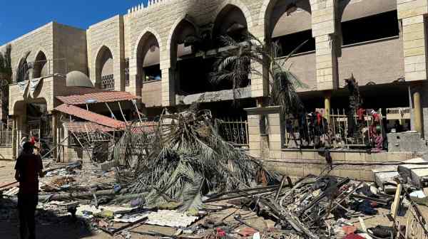 Palestinians look at damages at the site of an Israeli strike on a school sheltering displaced people&nbsp;amid the Israel-Hamas conflict&nbsp;in&nbsp;Gaza.&nbsp;