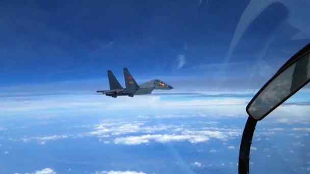 A Chinese fighter jet flies during a patrol over the South China Sea in this undated photo released Aug. 6, 2016, by China's Xinhua News Agency.