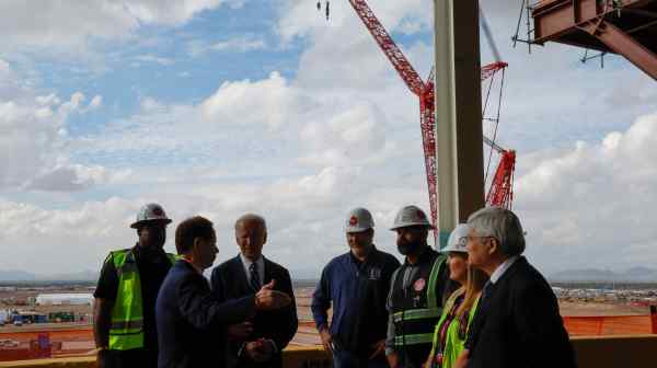 U.S. President Joe Biden, third from left, visits the site of a planned Taiwan Semiconductor Manufacturing Co. plant in Arizona in 2022.