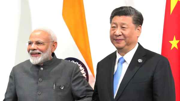 Indian&nbsp;Prime Minister Narendra Modi,&nbsp;left, and Chinese&nbsp;President Xi Jinping meet on the sidelines of the G20 summit in Osaka in 2019.