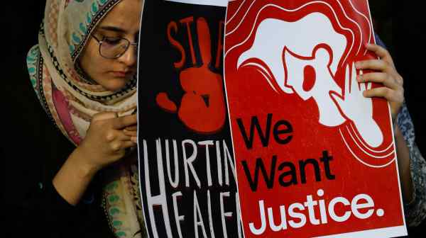 Medical students hold posters in protest over the&nbsp;rape&nbsp;and murder of a young female doctor inside a hospital in Kolkata,&nbsp;India.