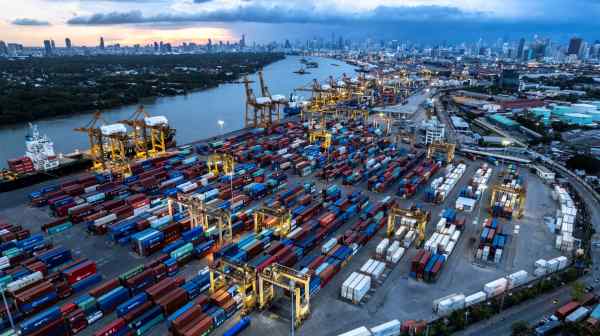 Containers await shipment at a port on the Chao Phraya River in Bangkok.&nbsp;