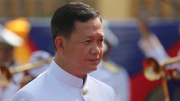 Hun Manet, then nominee for Cambodia's prime minister, stands outside the National Assembly in Phnom Penh in August 2023.