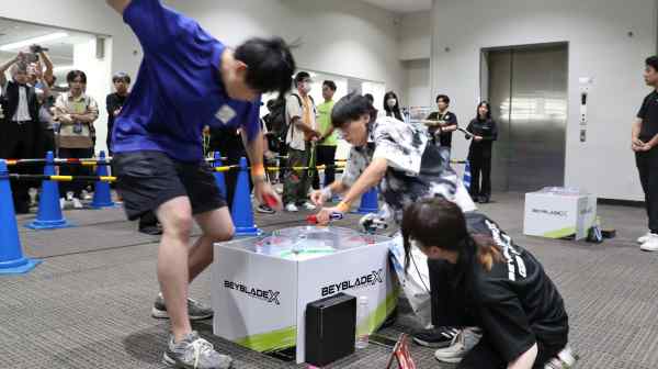 More than 500 people participated in an official Beyblade competition in Osaka in July. (Photo by Tomohide Yamaguchi)