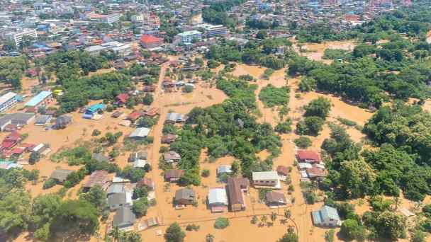 An aerial view shows trees and houses in the aftermath of floods, in Phrae Province, Thailand, Aug. 24. (Thailand's Department of Royal Rainmaking and Agricultural Aviation/Handout via Reuters)