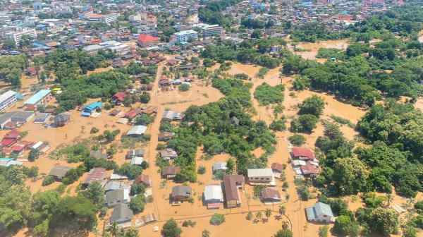 An aerial view shows trees and houses in the aftermath of floods, in Phrae Province, Thailand, Aug. 24. (Thailand's Department of Royal Rainmaking and Agricultural Aviation/Handout via Reuters)